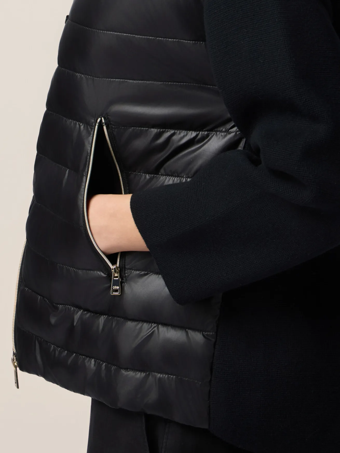 Daunenjacke mit Strickteilen
